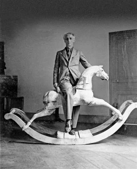 Max Ernst with rocking horse, Paris, 1938 - © 2013, ProLitteris, Zurich - Photo: Max Ernst Museum Brühl des LVR, Stiftung Max Ernst