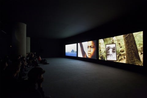 John Akomfrah, The Unfinished Conversation, 2012 - 3 channel HD video installation, colour, sound, 46 min - Courtesy the artist
