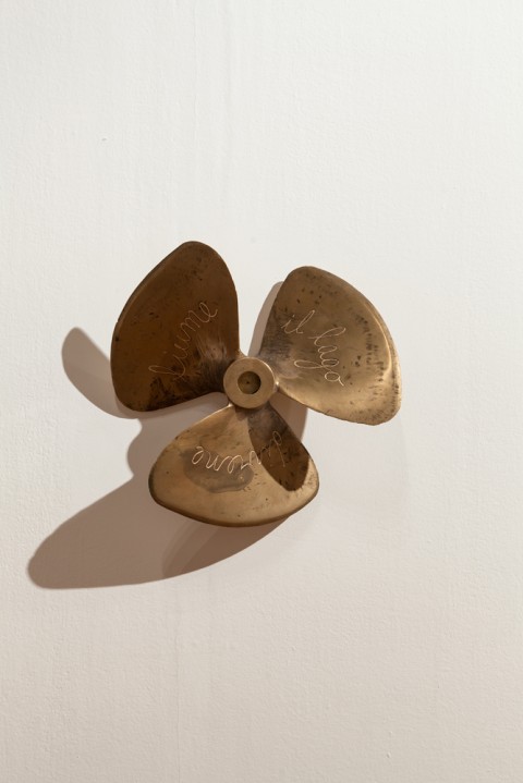 Giovanni Ozzola, Propeller. L'Eterno Ritorno, 2013 - brass, hand written texts - ø 50 x 10 cm Courtesy the artist and Galleria Continua - Photo Gustavo Rugeles G.