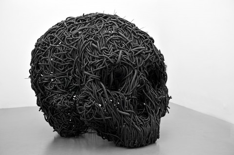 Paolo Grassino, Ciò che resta, 2012, tubo corrugato e ferro