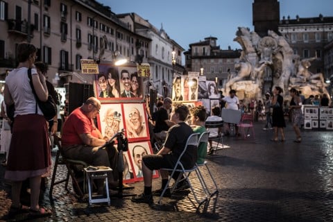 Caricaturisti a lavoro in Piazza Navona