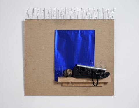 Bruna Esposito, Se fossi sasso, 2014, Cellophane, pigeon deterrent, shoe, stone on wooden panel, 75 x 77 cm.