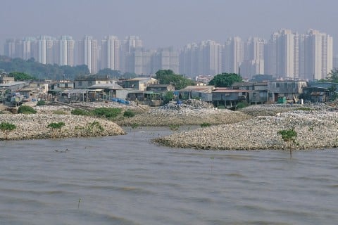 Uneven Growth (Mak) – Lau Fan Chan-oyster farm in front of Tin Shui Wai New Town, Hong Kong, 2014 ©MAP Office