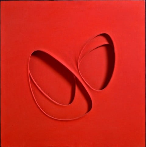 Paolo Scheggi, Intersuperficie curva dal rosso, 1964, acrilico rosso su tre tele sovrapposte