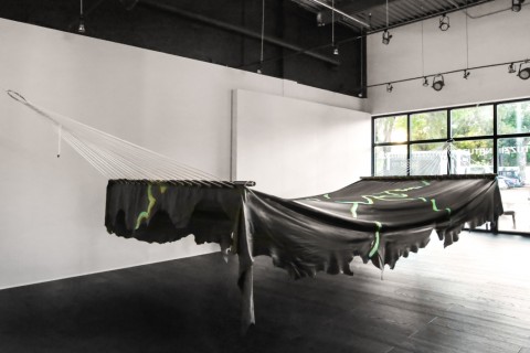 Adrien Missika, [ham-uh k], 2015, leather, acrylic paint, stainless steel, polypropylene, 800 x 265 x 200 cm, Natuzzi Store, Miami, photo by Monica Schipper