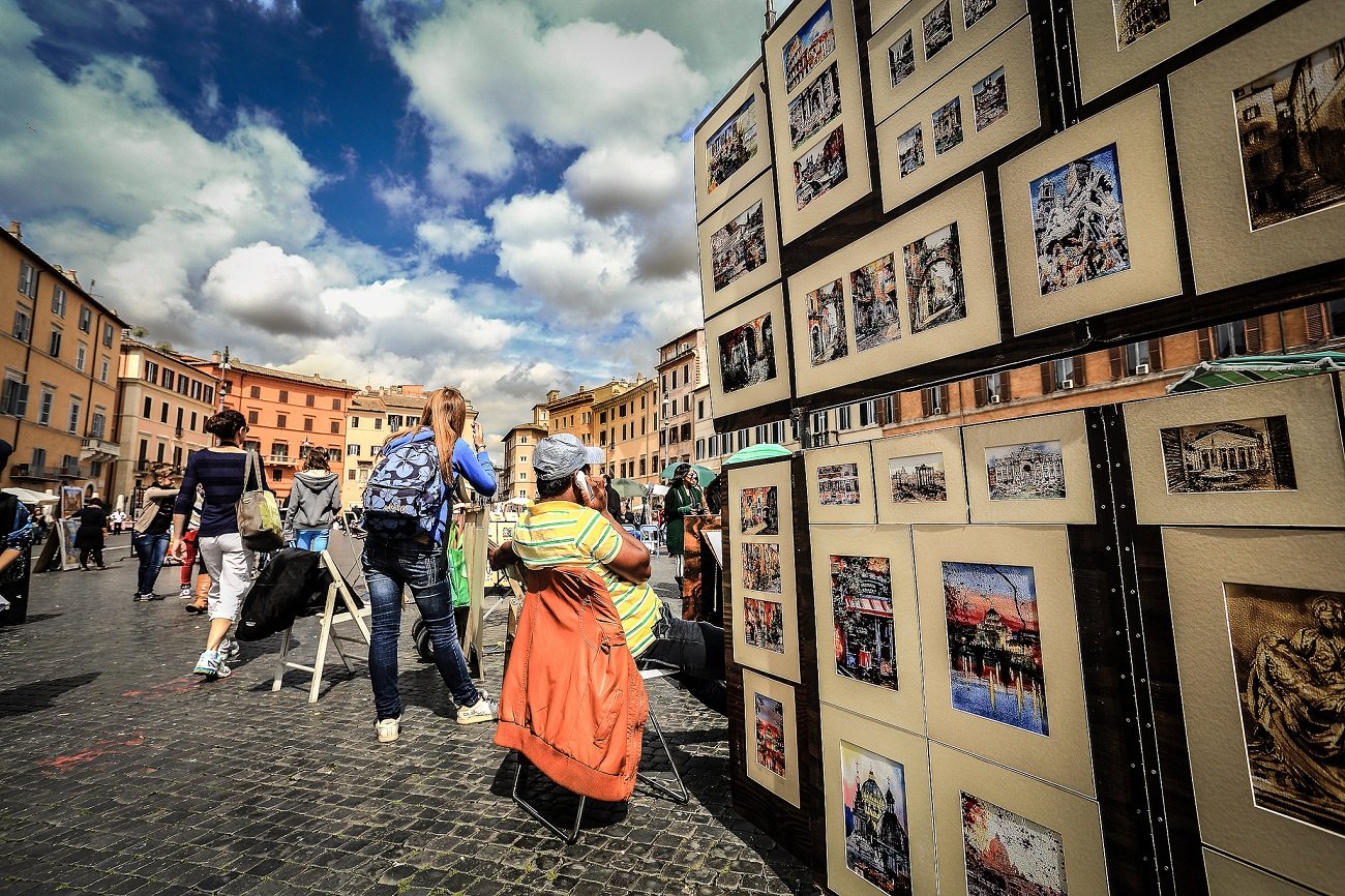 Pittori di strada in Piazza Navona. Foto Roberto Taddeo via Flickr 