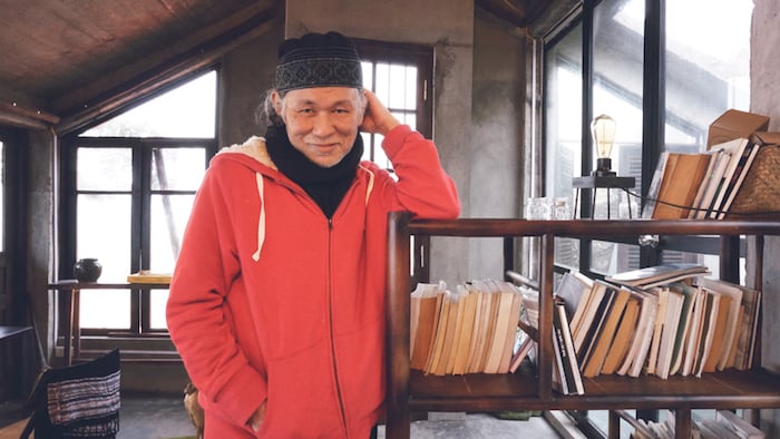 Award winning writer Nguyen Qui Duc at his home in Vietnam. Courtesy of VAWAA