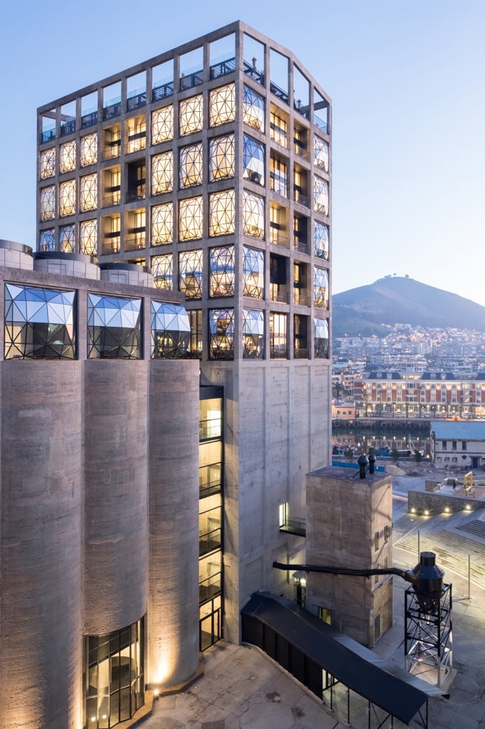 Heatherwick Studio, Zeitz MOCAA, Cape Town. Exterior at dusk. Photo Iwan Baan