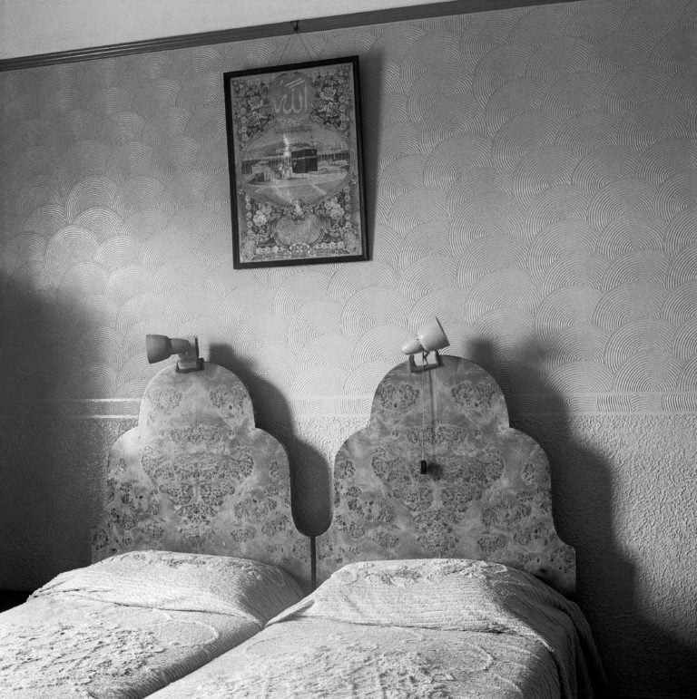 David Goldblatt, The bedroom of Ozzie and Sarah Docrat before its destruction under the Group Areas Act, Fietas, Johannesburg. 1977. David Goldblatt Goodman Gallery