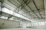 1. DC NEXT Blocco Taibon la Nuova Fabbrica Spazi interni APL Est foto Giacomo de DonaÌ€ Riqualificare e rilanciare, con l’arte. Gli spazi dismessi delle vette bellunesi continuano l’iter di rinascita. Grazie a Dolomiti Contemporanee. Arriva DC Next