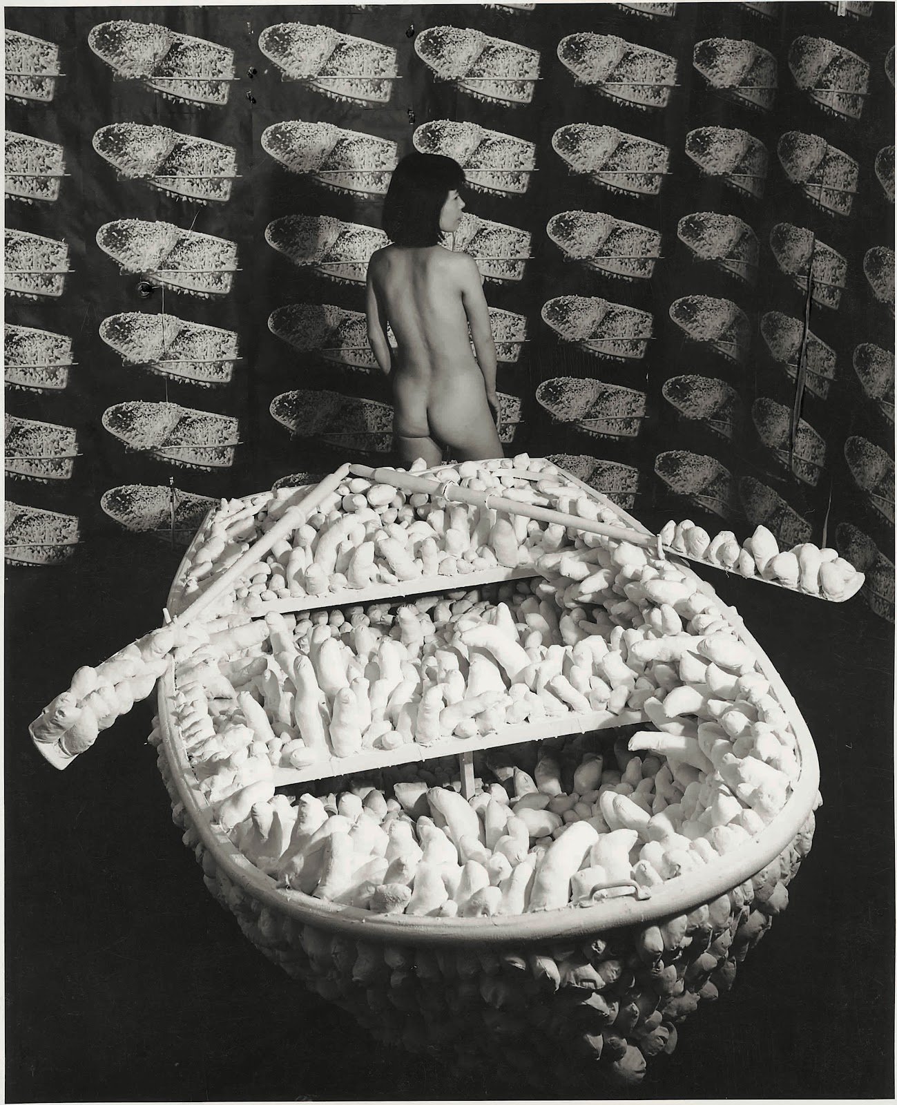 Yayoi Kusama posing in Aggregation...n paper Yayoi Kusama