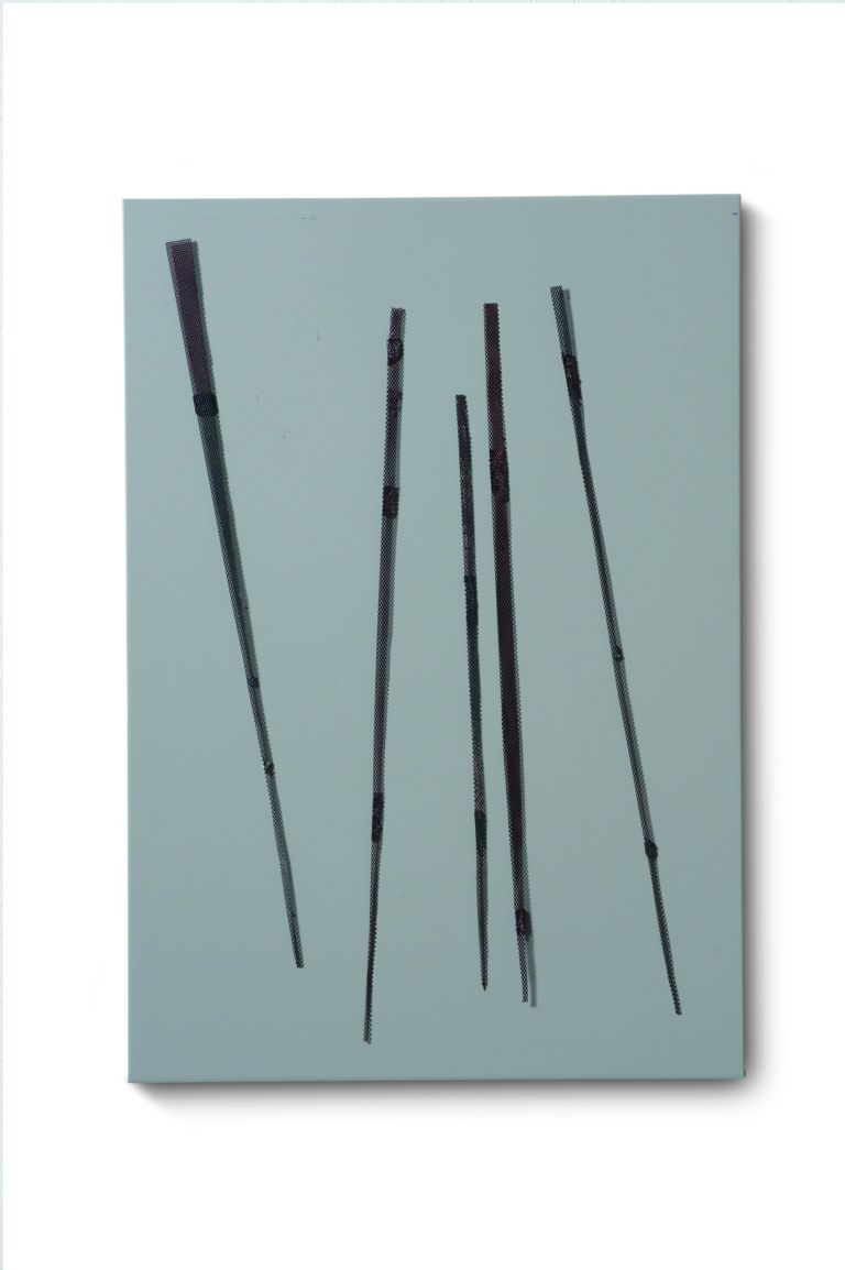 2.Tavola magnetica Omaggio a L.F. 1961Tavola di ferro con elementi mobili a calamita 60 x 42 cm Grazia Varisco: feconde anomalie