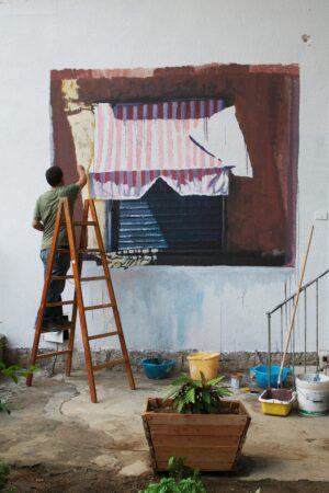 Un progetto, cinque artisti, una serie di scenografici wall painting. Ecco i “Wallz” di Palermo. Un museo? Una galleria? No, un centro sociale. Arte contemporanea al Laboratorio Zeta