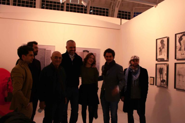 Giancarlo Politi allo stand The Promenade Artan Shabani è il secondo da destra Flash Art Event Updates: ma in Albania si vendono opere d’arte? Da Belgrado a Valona, storie di galleristi e di nomadismi dall’est Europa