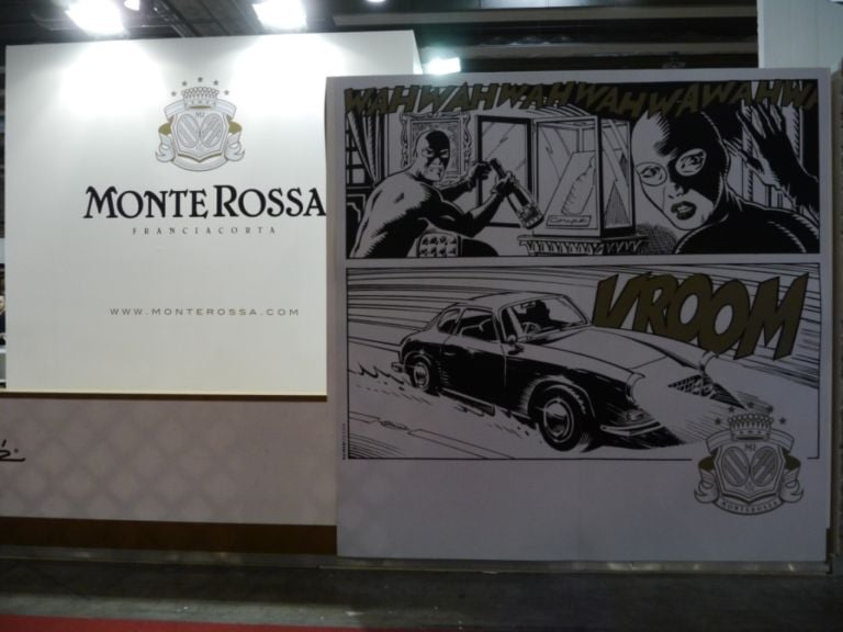 Diabolik in Franciacorta Brindisi a regola d’arte: fotogallery da Vinitaly, a caccia di etichette d’artista e allestimenti griffati. Dall’omaggio dell’Abruzzo a Mario Giacomelli fino alle sensuali atmosfere di Milo Manara