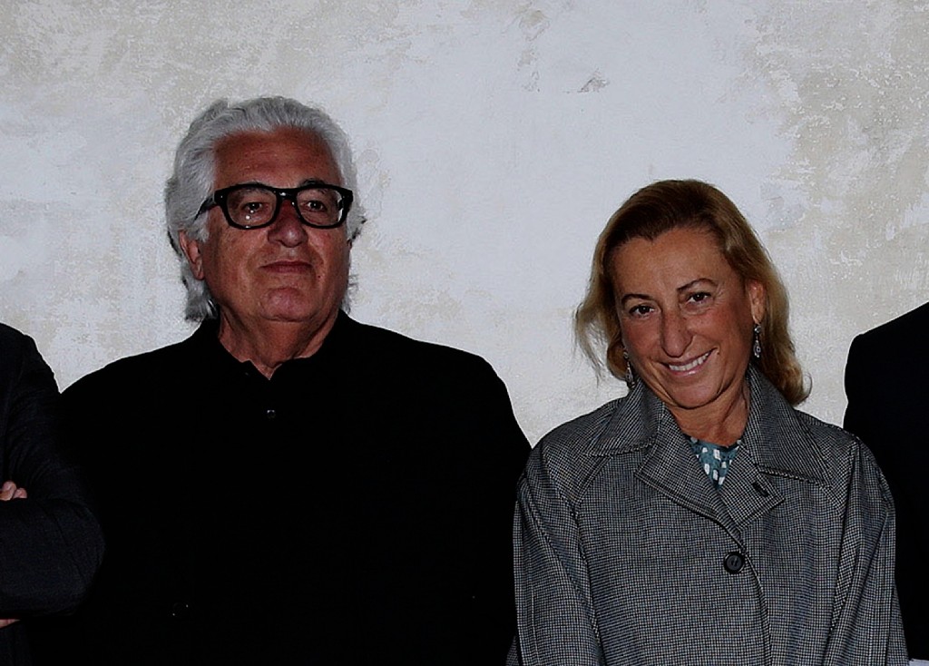 Miuccia Prada e Germano Celant premiati a New York dall’Independent Curators International. E intanto a Milano proseguono i lavori della sede griffata Koolhaas: qui l’update…