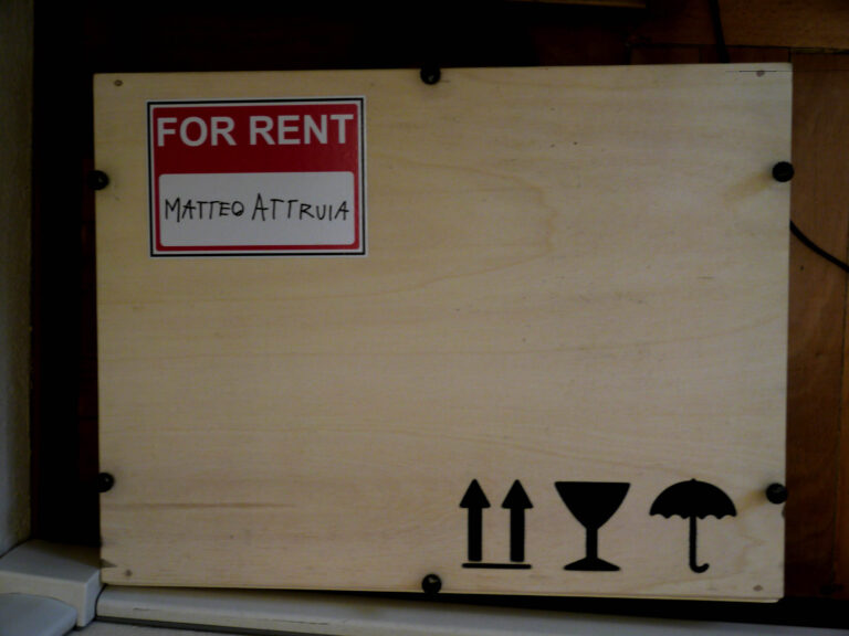 attruia 2 Quest’opera non è in vendita: ma solo in affitto. Matteo Attruia lancia il progetto “For Rent”, con un light-box pensato per passare di casa in casa. Riflessione ironica sulle impalpabili variabili del mercato...