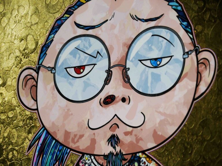 Takashi Murakami a Milano 2 Milano aperta per ferie con Murakami: videointervista all’artista, alla sua prima mostra in uno spazio pubblico italiano. E al suo primo film