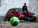 BRAZIL. Sao Paolo. June 11 2014. Kids playing football in Favela do Moinho. World Cup starts today. Film still. © Jonas BendiksenMagnum Photos Il bello e il brutto dei Mondiali di Calcio in Brasile. A Torino due mostre della Magnum da Adplog, lo spazio di Alessandro Del Piero. Prove generali per il futuro Centro Italiano per la Fotografia Camera