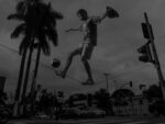 BRAZIL. Sao Paulo. July 11 2014. Jalison Nougueira 22 who earns money by performing everyday on Rua dos Estados Unido at the corner of Aenida 9th Julho. Hes been training as a freestyle footballer on a tight rope since he was 11 ye Il bello e il brutto dei Mondiali di Calcio in Brasile. A Torino due mostre della Magnum da Adplog, lo spazio di Alessandro Del Piero. Prove generali per il futuro Centro Italiano per la Fotografia Camera