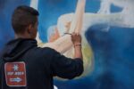 Boris Veliz al lavoro Pao, Tawa, TvBoy brindano a Campari: undici interventi di street-art per la sede storica dell’azienda a Sesto San Giovanni, nel suo centodecimo compleanno