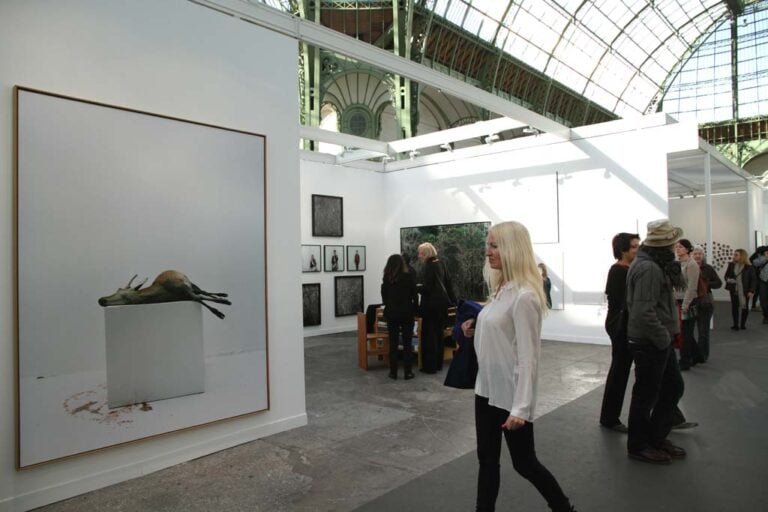 Vista esposizione 18 Grand Palais Paris Photo 2014 foto Claudia Brivio Ecco il racconto per immagini del primo giorno Paris Photo. Fotografie da un milione e mezzo di dollari, Thomas Ruff in conversation, le recenti acquisizioni del MoMA, E tanti capolavori fra gli stand