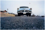 william eggleston untitled blue car on suburban street memphis tn 1970 La sfida di William Eggleston: raccontare l’America, con la forza del colore. Una mostra alla Fondazione Cartier-Bresson