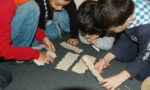 MANN - bambini ricostruiscono i papiri