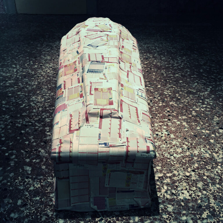 Sislej Xhafa, Tractatus Logico Flat, 2013 , bara, biglietti della lotteria , 250 x 65 x 35 (h) cm.  Courtesy GALLERIA CONTINUA, San Gimignano / Beijing / Les Moulins