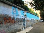 Andrea Cardia work in progress per Il muro era vuoto Roma 2015 4 Andrea Cardia presenta il suo murale al Pigneto. Metri e metri di colore, per omaggiare la storia recente d’Italia, di Roma e del quartiere