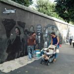 Andrea Cardia work in progress per Il muro era vuoto Roma 2015 6 Andrea Cardia presenta il suo murale al Pigneto. Metri e metri di colore, per omaggiare la storia recente d’Italia, di Roma e del quartiere