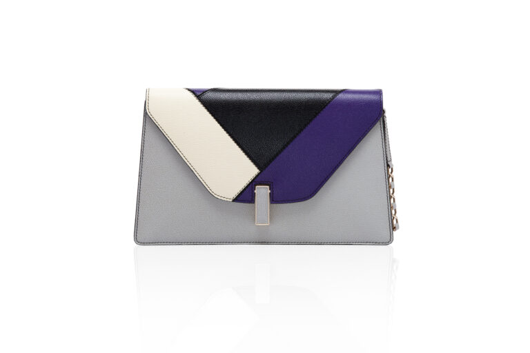 Martino Gamper for Valextra Isis Clutch grey violet Salone Updates: Martino Gamper cambia look alla boutique di Valextra, in Via Manzoni. Un'installazione tutta nuova