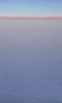 Piero Guccione, Piccole nuvole rosa, 2005, olio su tela, cm 125 X 75, collezione privata