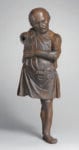 Statuetta bronzea di un artigiano con occhi d'argento
