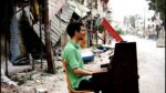 Ayham Ahmed 3 Il pianista in trincea. L’omaggio di Eron a Aeham Ahmad