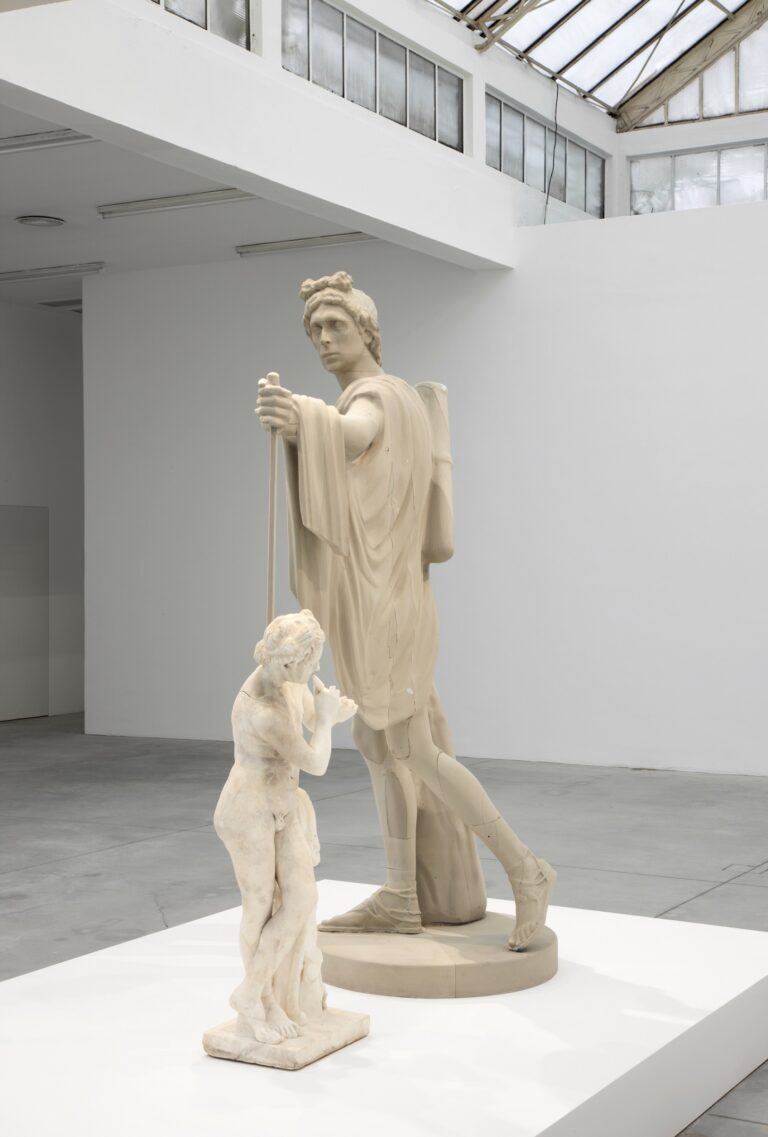 Francesco Vezzoli, Metamorfosi (Self-portrait As Apollo killing the Satyr Marsyas), 2015, 2 parts, Roman Imperial marble figure of a satyr playing the pipe, self-portrait polyurethane sculpture, Satyr: 112,1 cm / Apollo: 220 cm, Courtesy the artist and Galleria Franco Noero, Torino