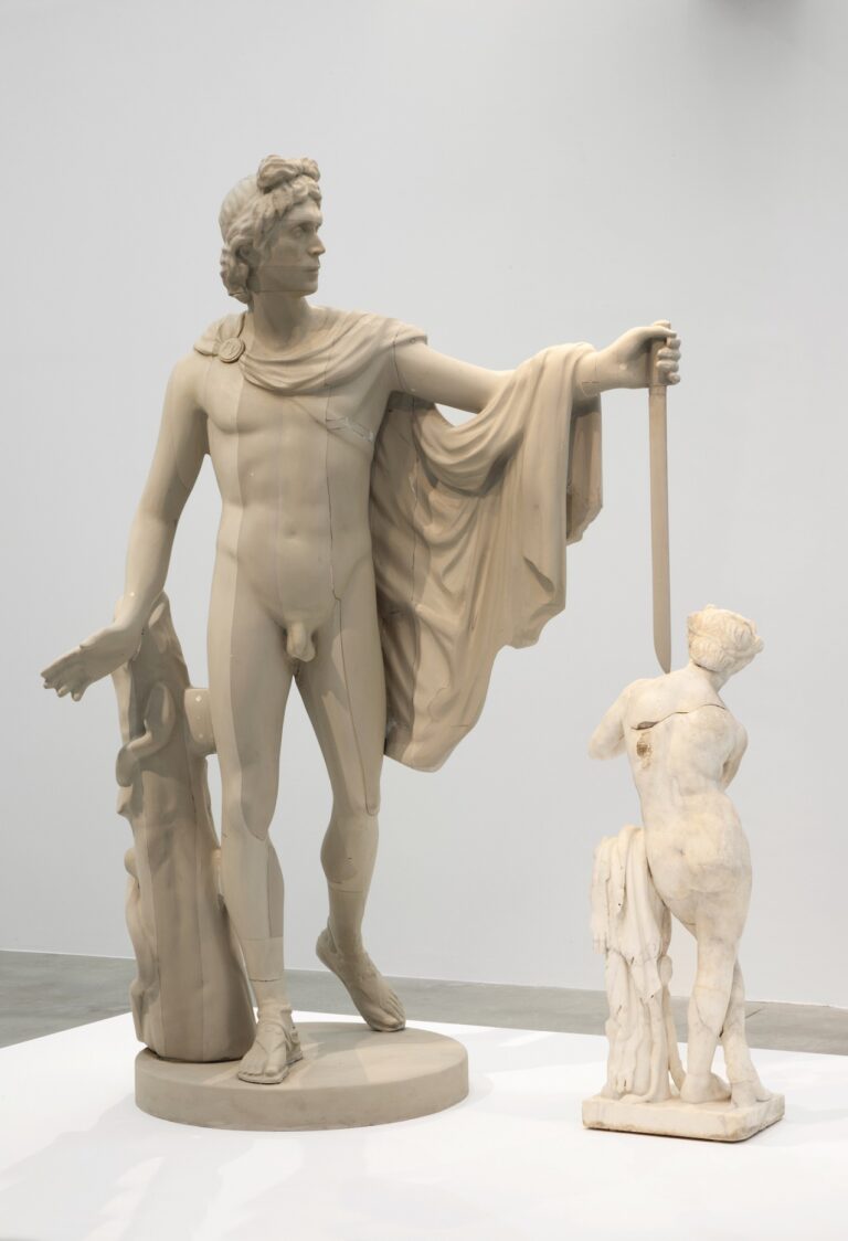 Francesco Vezzoli, Metamorfosi (Self-portrait As Apollo killing the Satyr Marsyas), 2015, 2 parts, Roman Imperial marble figure of a satyr playing the pipe, self-portrait polyurethane sculpture, Satyr: 112,1 cm / Apollo: 220 cm, Courtesy the artist and Galleria Franco Noero, Torino