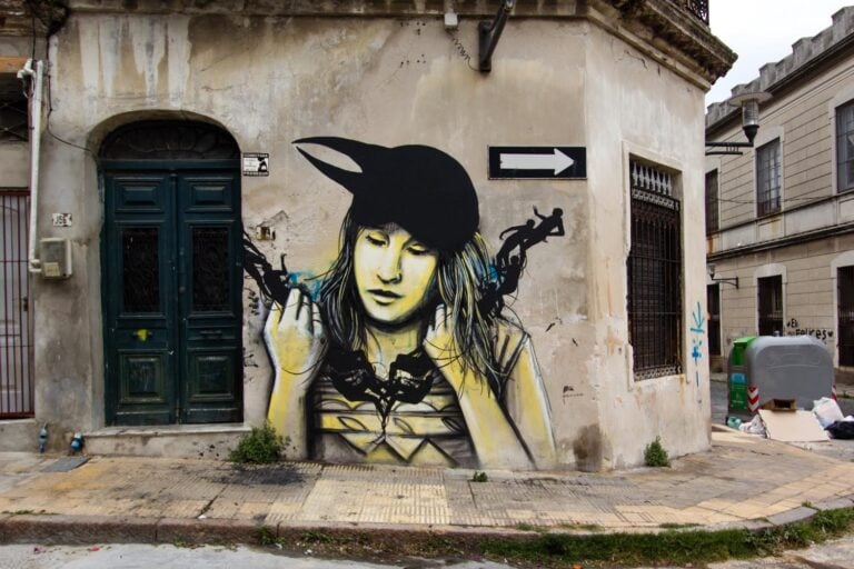 AlicePasquini e David De La Mano Montevideo Uruguay 2015 Photo Jessica Stewart Italiani in trasferta. I murales di Alice Pasquini in Sud America, per l’IIC di Montevideo. Fiumi, scorci urbani, volti infantili e accenti surreali