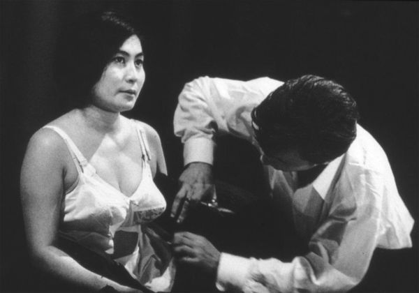 Yoko Ono, Cut Piece, 1964 - performed by Yoko Ono, Carnegie Recital Hall, New York, March 21, 1965 – photo Minoru Niizuma - courtesy Lenono Photo Archive, New York