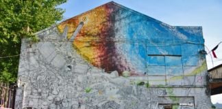 Il murale di Blu per il Cso Xm24, a Bologna