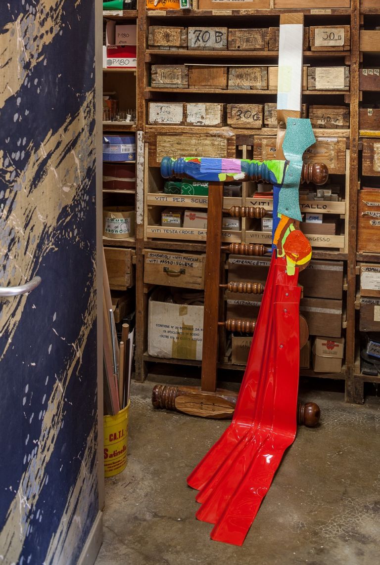 Jessica Stockholder, #322 Untitled, 1999, Bed post, linoleum, lumber, hardware, red plastic molding, oil paint, 166,3 x 71,1 x 121,9 cm, Courtesy Raffaella Cortese Gallery, Milan