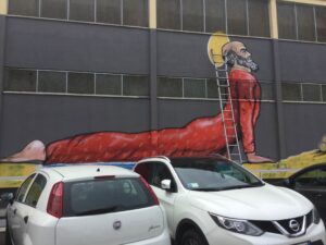 Video intervista allo street artist Maupal che mette al muro San Nicola. E lo fa proprio a Bari durante i festeggiamenti