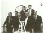 Fondazione dell'Istituto Patafisico Vitellianense. Viadana, 19 Marzo 1994. Da sinistra: Enrico Baj, Pietro Baj, Davide Servadei, Giuliano Dalla Casa, Afro Somenzari (Rettore Fondatore). In alto: Ugo Nespolo, Giorgio Boccherini