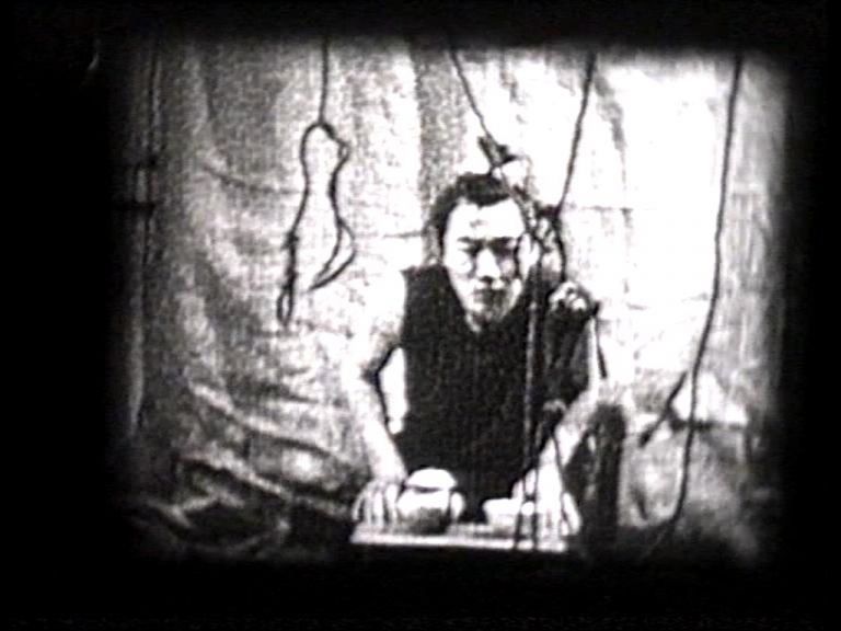 Alexander Ugay, Tea ceremony, 2001, still da video, Courtesy Laura Bulian Gallery