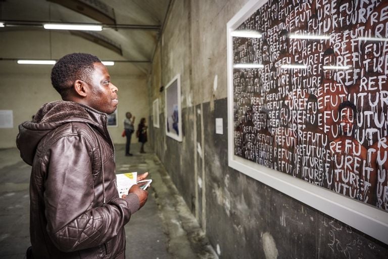 Liu Bolin. Migrants. Exhibition view at Cantieri Culturali alla Zisa, Palermo 2017