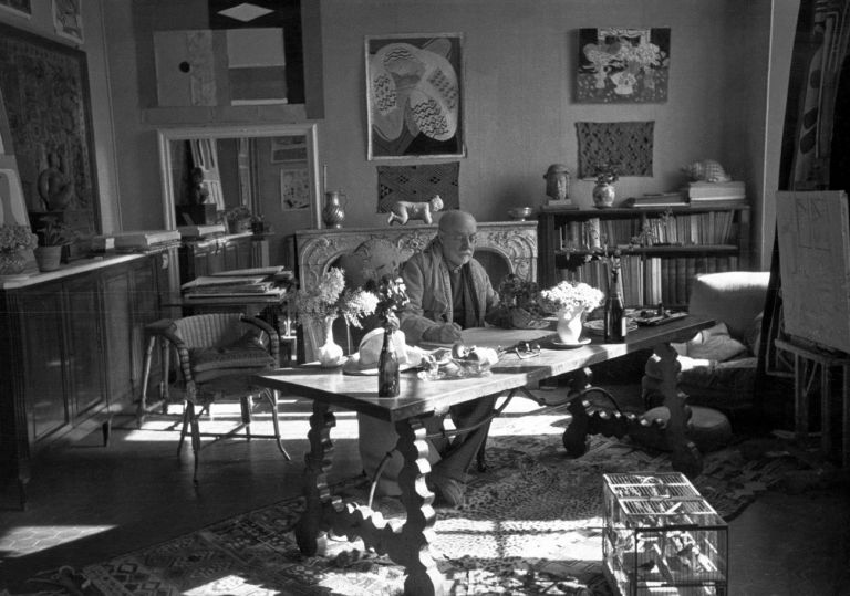 Matisse with his collection of Kuba cloths and a Samoan tapa, Vence, France, 1944. Courtesy Museum of Fine Arts, Boston