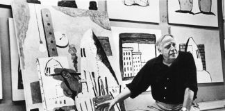 Philip Guston accanto a The Studio, 1969. Photo Frank Lloyd