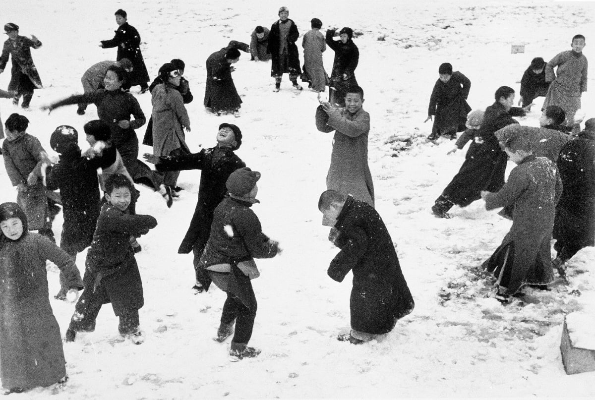 Robert Capa, China. Hankou. March, 1938. Children playing in the snow.