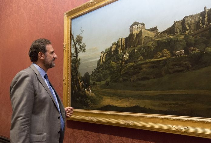 National Gallery Director, Dr Gabriele Finaldi looks at the Bellotto (c) National Gallery, London