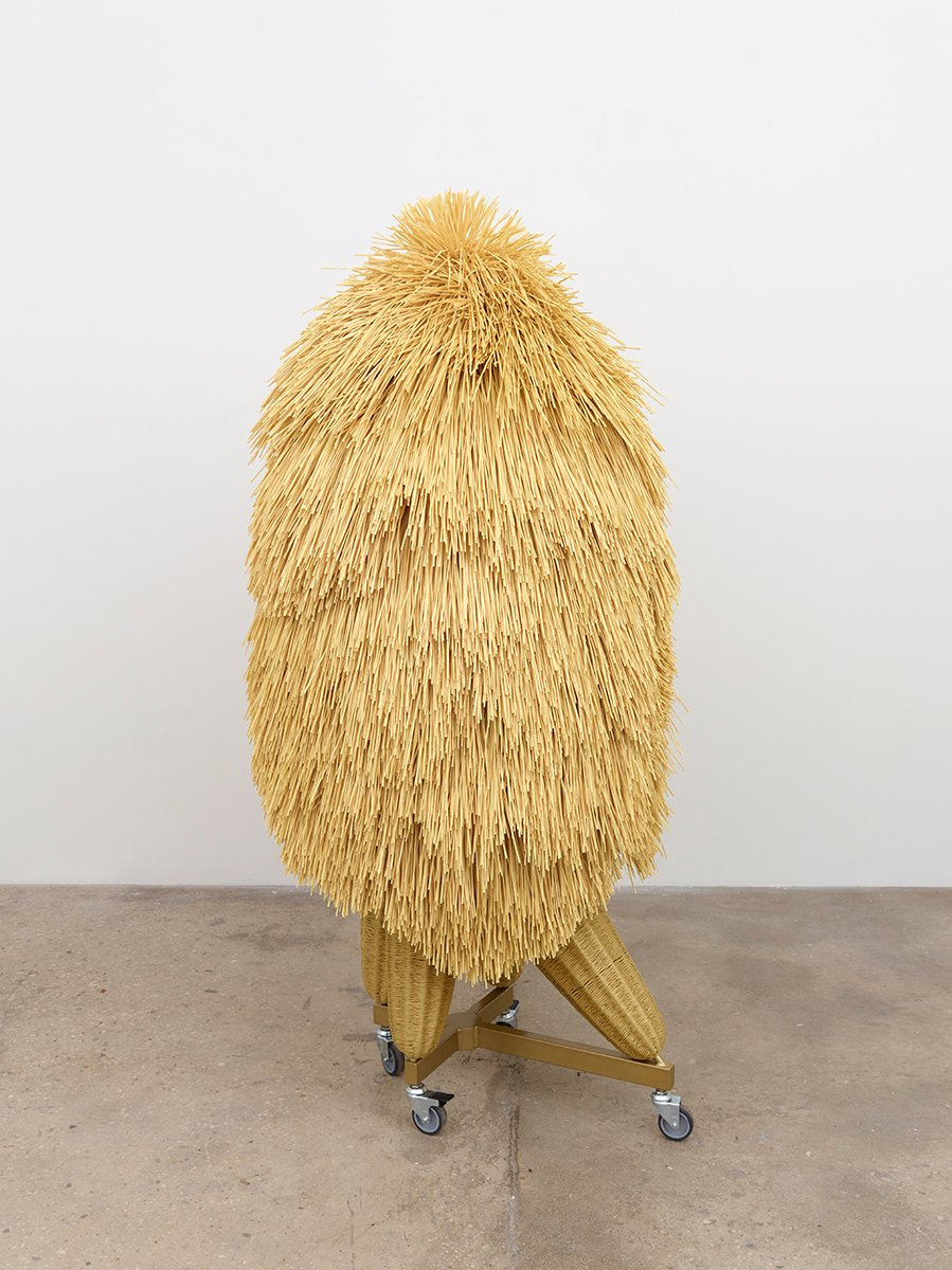 Haegue Yang The Intermediate – Asymmetric Quadrupedal Bushy-head 2016 Artificial straw, steel stand, powder coating, casters. Courtesy of the artist and Greene Naftali, New York